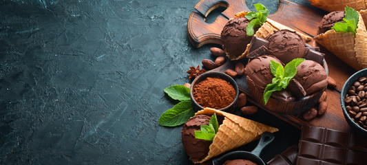 Chocolate ice cream with chocolate. Top view. Free space for your text.