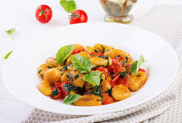 Gnocchi pasta in rustic style.  Italian cuisine. Vegetarian vegetable pasta. Cooking lunch. Gourmet dish.