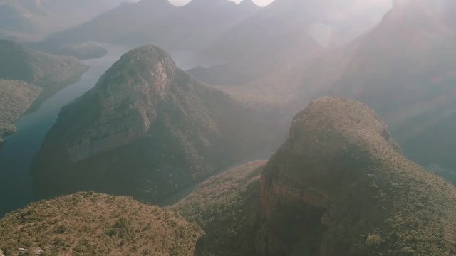 Aerial Shot Woman Sitting Overlooking Blyde River Canyon.
