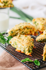 Savory scones with feta mozarella and green herbs.