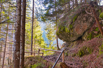 The picturesque path leading to  Pericnik waterfall. Winter forest landscape