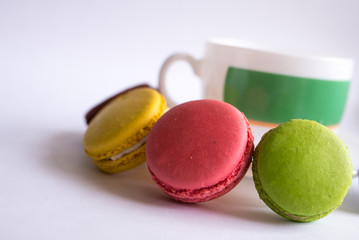 colorful macaroons on white background
