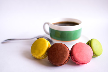 colorful macaroons in a cup