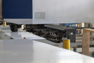 Modern industrial machine with digital program control for metal working in the factory workshop