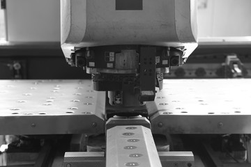 Modern industrial machine with digital program control for metal working in the factory workshop