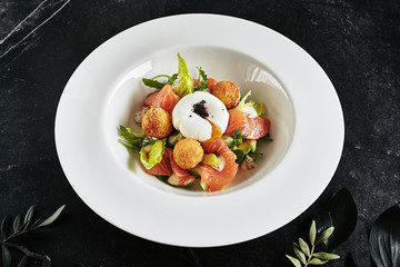 Beautiful Restaurant Plate of Trout Fillet 48 Degrees and Egg Poached with Warm Potatoes