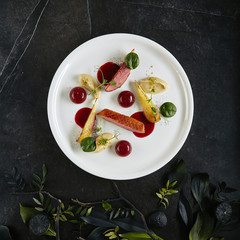 Exquisite Serving Creative Molecular Dish of Duck Breast, Baked Pear and Cherry Spheres Top View