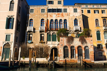 Fototapeta na wymiar Sunny winter day in Venice, shot from channel