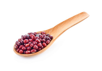 Red bean seeds In wooden spoon on white background