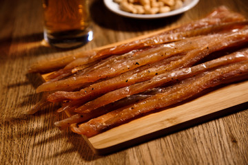 Fish barbecue with glass of bear