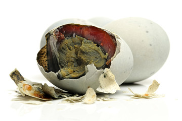 preserved duck eggs on white background