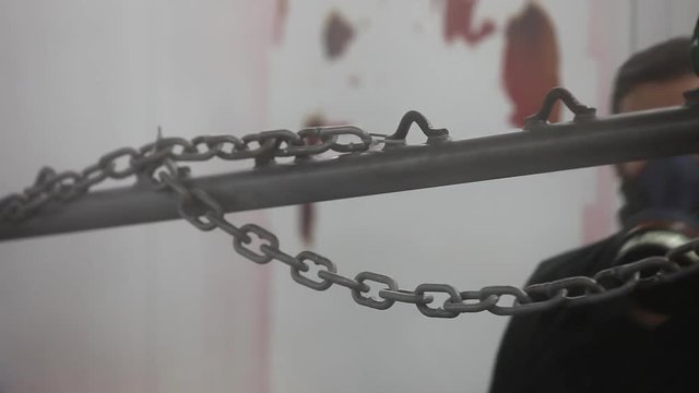 Professional air brusher working in a factory on metal parts 5