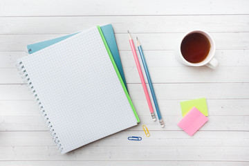 Clean white notebook and pencil with copy space on white table background for presentation, writer...
