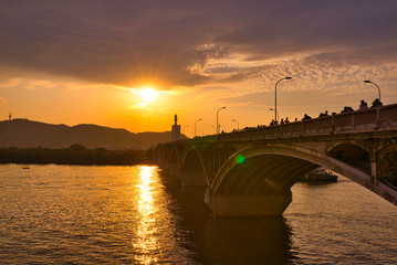 The Hunan Xiangjiang bridge in Changsha on a sunset. Changsha, China
