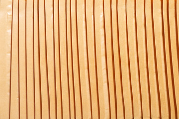 Stack of bubble envelopes, textured background