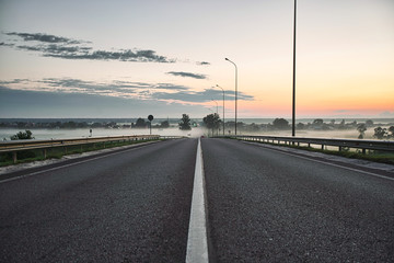 Fototapeta premium Evening road landscape, great design for any purposes. Nature background. Night landscape. Dramatic nature background.