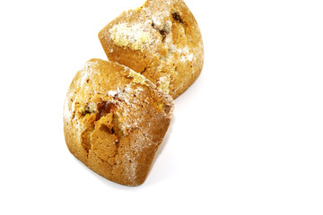 Fresh cupcakes with raisins and sweet white powder