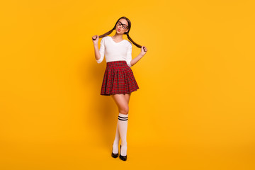 Fototapeta na wymiar Full length body size view of her she nice attractive winsome lovely lovable sweet cheerful girl eyeglasses eyewear sending kiss isolated over bright vivid shine yellow background