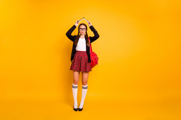 Full length body size view of her she nice attractive bored girl holding in hands book over head...