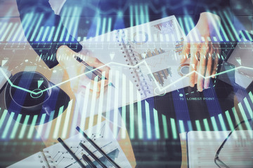 Multi exposure of woman's writing hand on background with data technology hud. Big data concept.