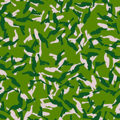 Forest camouflage of various shades of green and beige colors