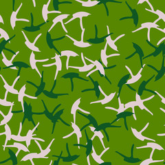 Forest camouflage of various shades of green and beige colors