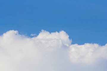 Fototapeta na wymiar White clouds with blue sky background.