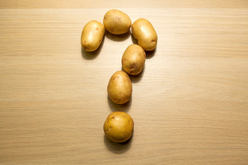 potato question mark table background nobody 