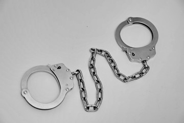 handcuffs on black background