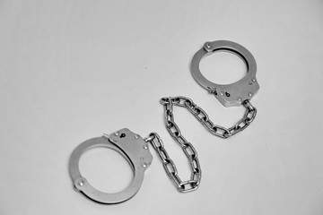 handcuffs on black background