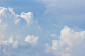 White clouds with blue sky background.