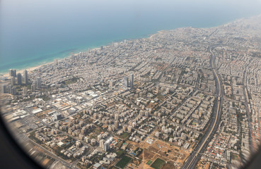 View of Tel Aviv city from the window of a flying airplane, Tel Aviv in Israel