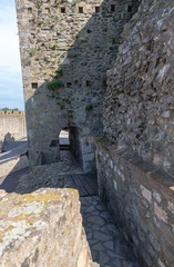 Fototapeta na wymiar The passage on the fortress wall in the ruins of the Smederevo fortress, standing on the banks of the Danube River in the town of Smederevo in Serbia.