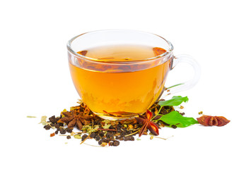 Black tea in a cup of glass. Mint and tea leaves. On white, isolated background