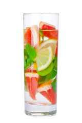 cold drink with different citrus and herbs in glasses on a white background. Cocktail