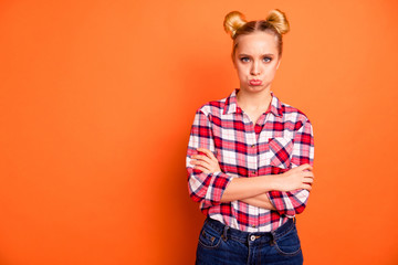 Close up photo attractive beautiful she her lady arms crossed bad mood not satisfied wrong not fair situation offense lips expression wear casual checkered plaid pink shirt isolated orange background