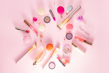 Naklejka premium Make up products and macaroons