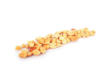 Ground roasted peanuts on white background.