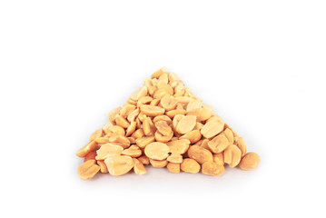 Ground roasted peanuts on white background.