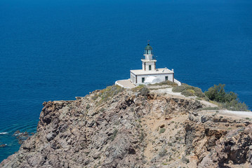 Fototapeta na wymiar Lighthouse Atop a Cliff