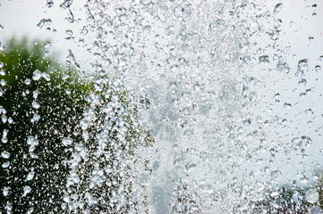 splashes of fountain water in the background