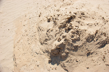 yellow sand the surface of small stones background