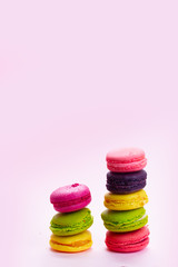 Macaroons cookies on pink