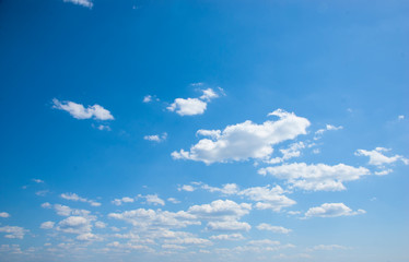 Naklejka na ściany i meble the sky is summer blue with white clouds