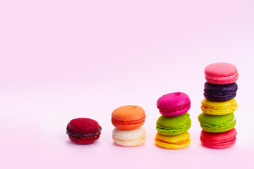 Macaroons cookies on pink