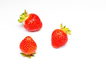 fresh organic strawberries on white background