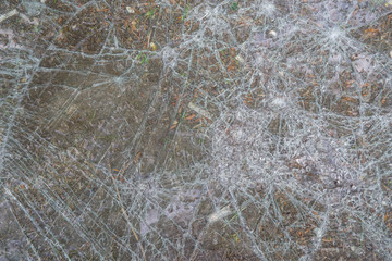 Broken in cracks windshield of the Car