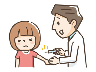 Fototapeta premium 男性医師と注射を我慢する女の子
