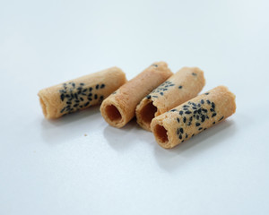 coconut crackers on white background closeup
