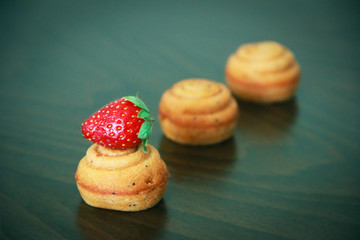 sweet yellow biscuit cakes shells with strawberry decor